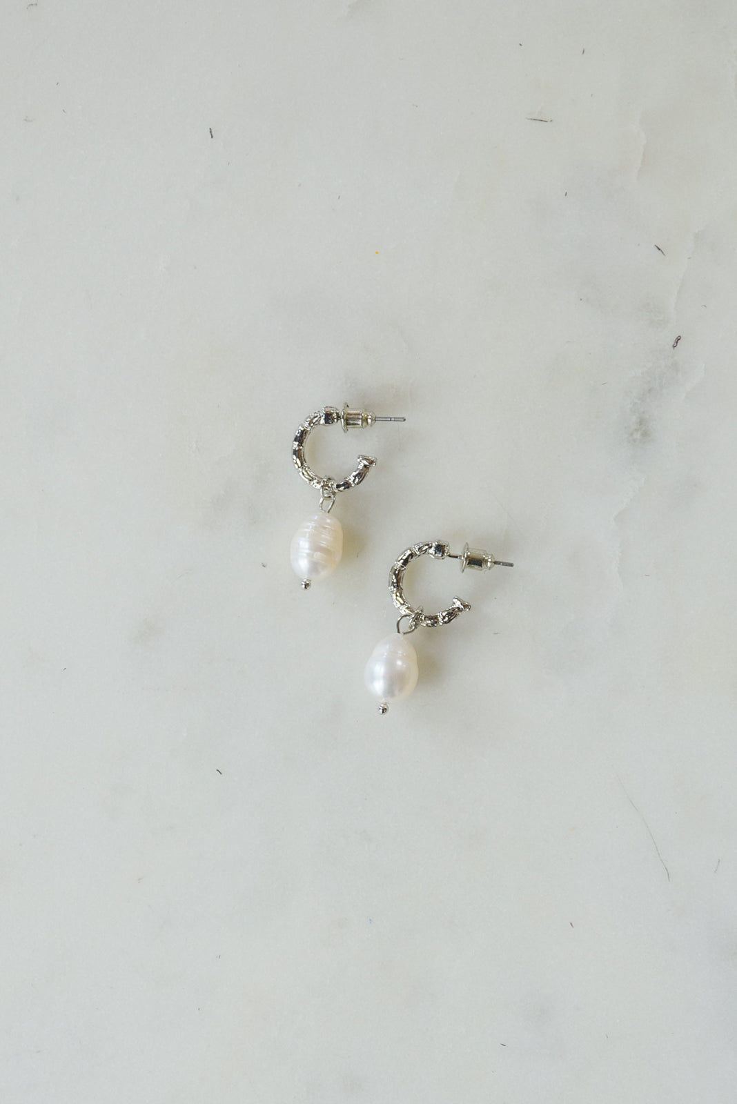 Drops Of Pearl Earrings In Silver